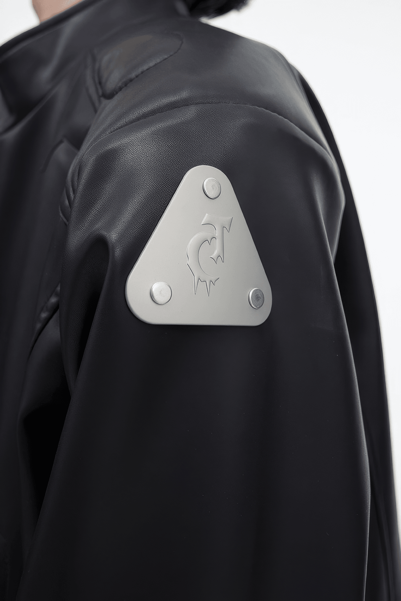 Short Leather Jacket – Modern Sculptural Design with Metal Logo - 4inme